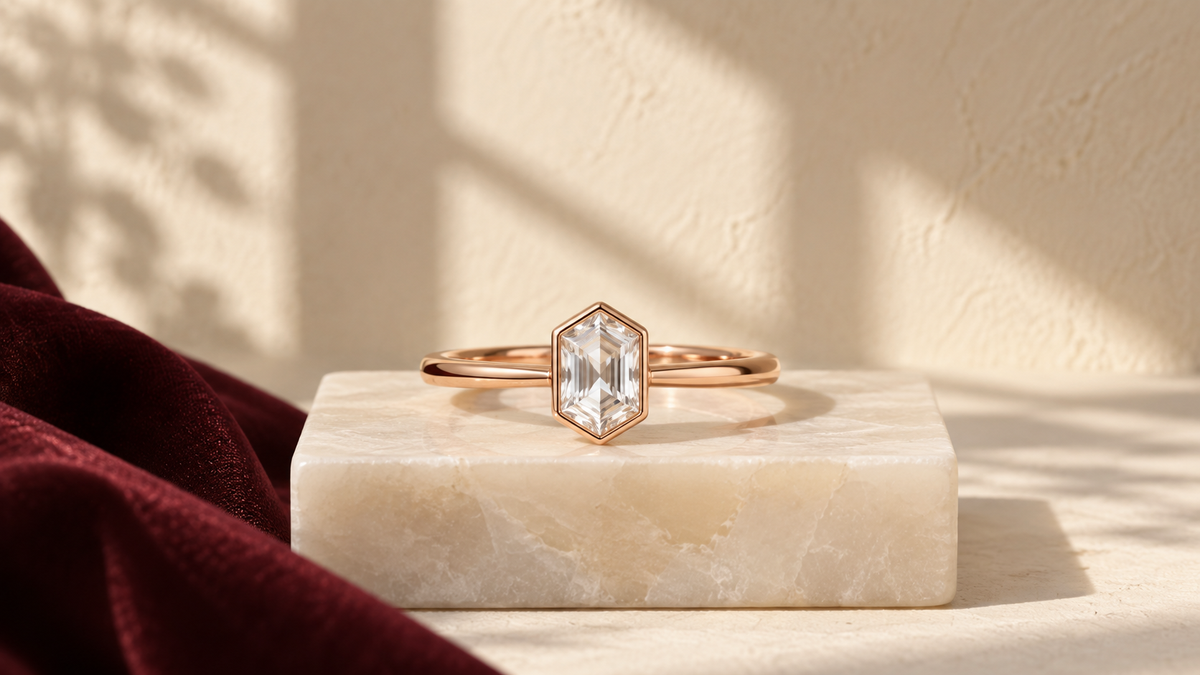 Briony Hexagon Bezel on an ivory stone plinth